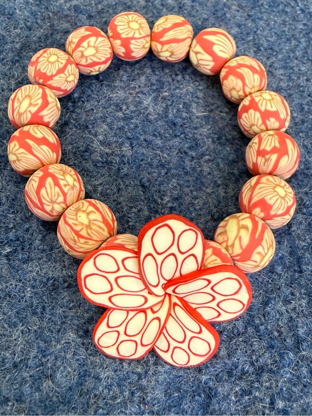 Floral tropical pendant beaded stretch bracelet pink cream tan